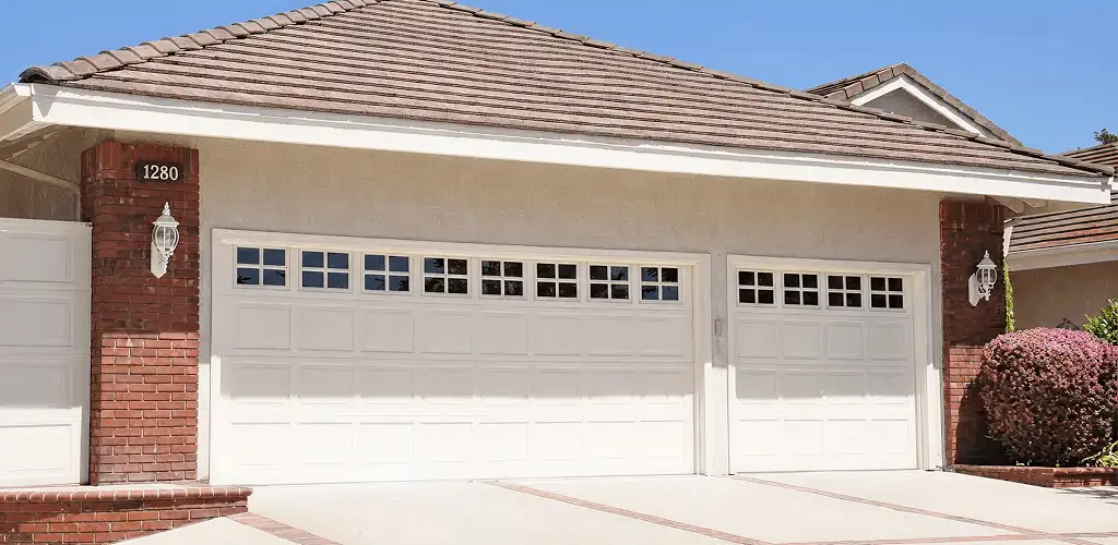 Residential garage door repair service for a double garage door in Long Beach, CA