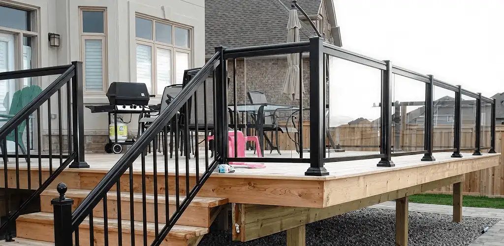 Handrail installation on a deck staircase for safety and code compliance in Long Beach, CA
